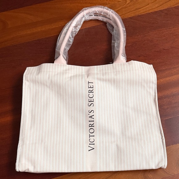Victoria's Secret Handbags - Victoria's Secret Pale Pink and White Striped Tote